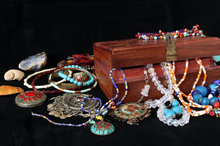 wooden jewelery chest and various jewelries