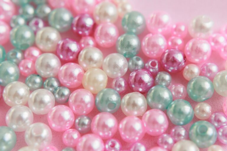 Pastel-colored beads for sewing, creativity and embroidery.