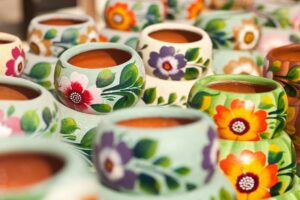 Variety of Colorfully Painted Ceramic Pots.