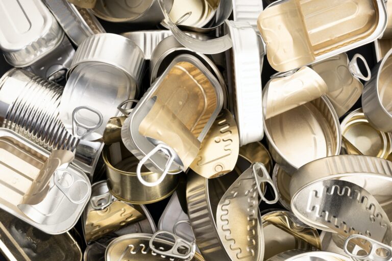 Variety of empty tin can background